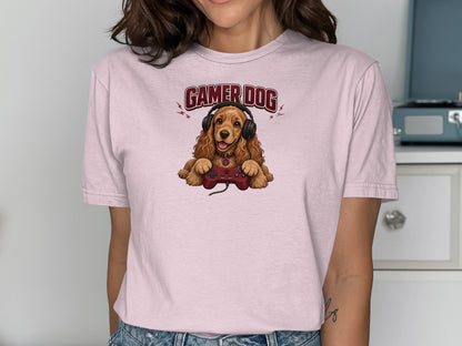 Dog wearing headphones and holding a video game controller.