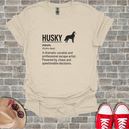 Beige t-shirt with black text "HUSKY (huhs-kee) A dramatic vocalist and professional escape artist."