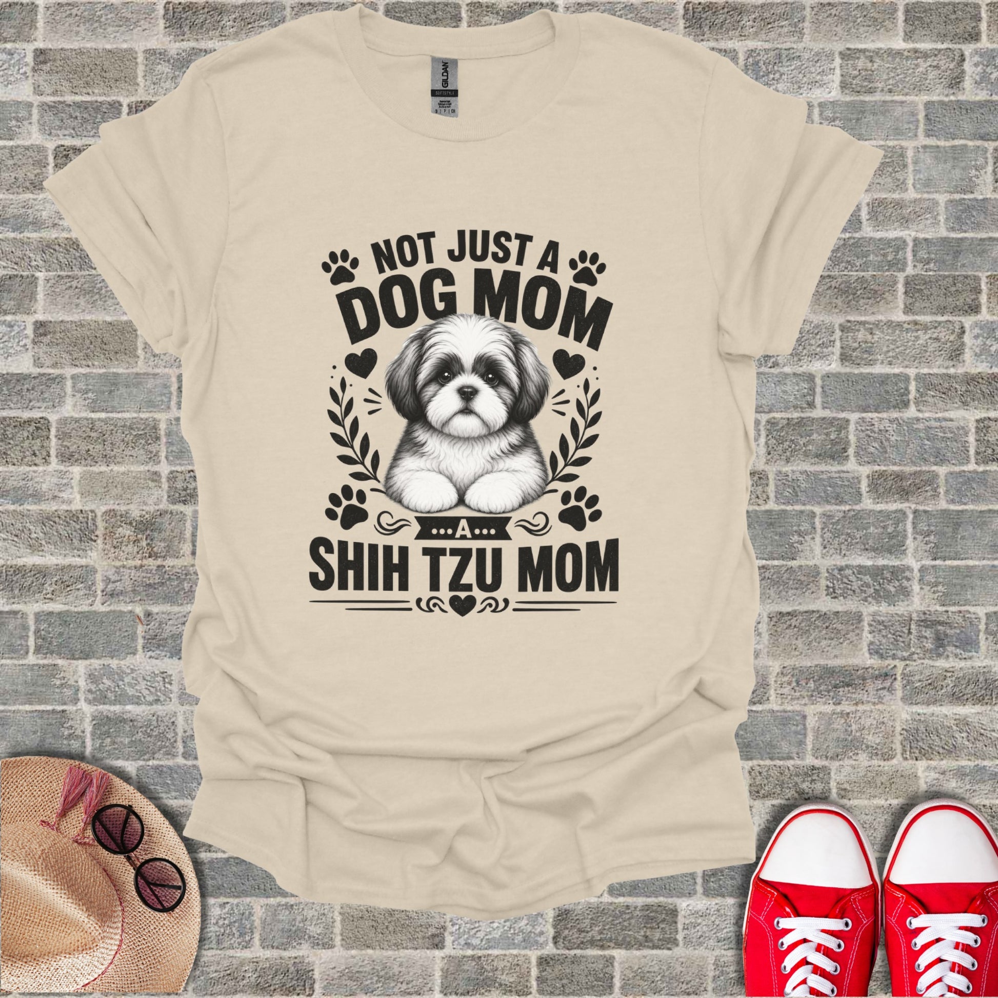 Cream t-shirt with black graphic of Shih Tzu and text "Not just a Dog Mom... A Shih Tzu Mom".