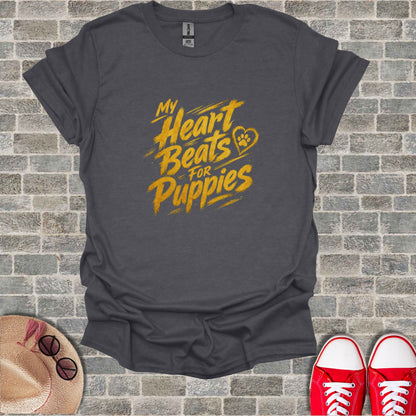 Dark grey t-shirt with "My Heart Beats For Puppies" text and heart icon.