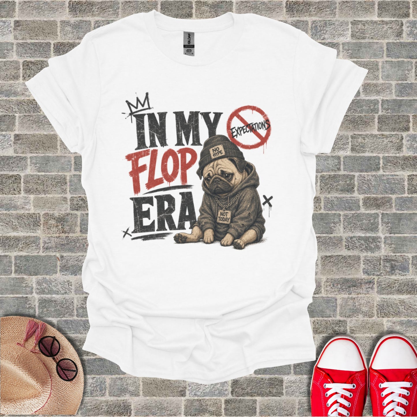 White t-shirt with "In My Flop Era" text and a pug wearing a hoodie.
