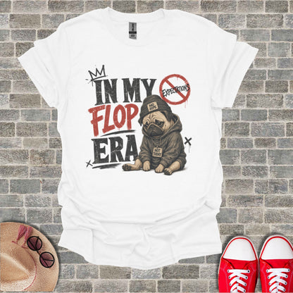 White t-shirt with "In My Flop Era" text and a pug wearing a hoodie.