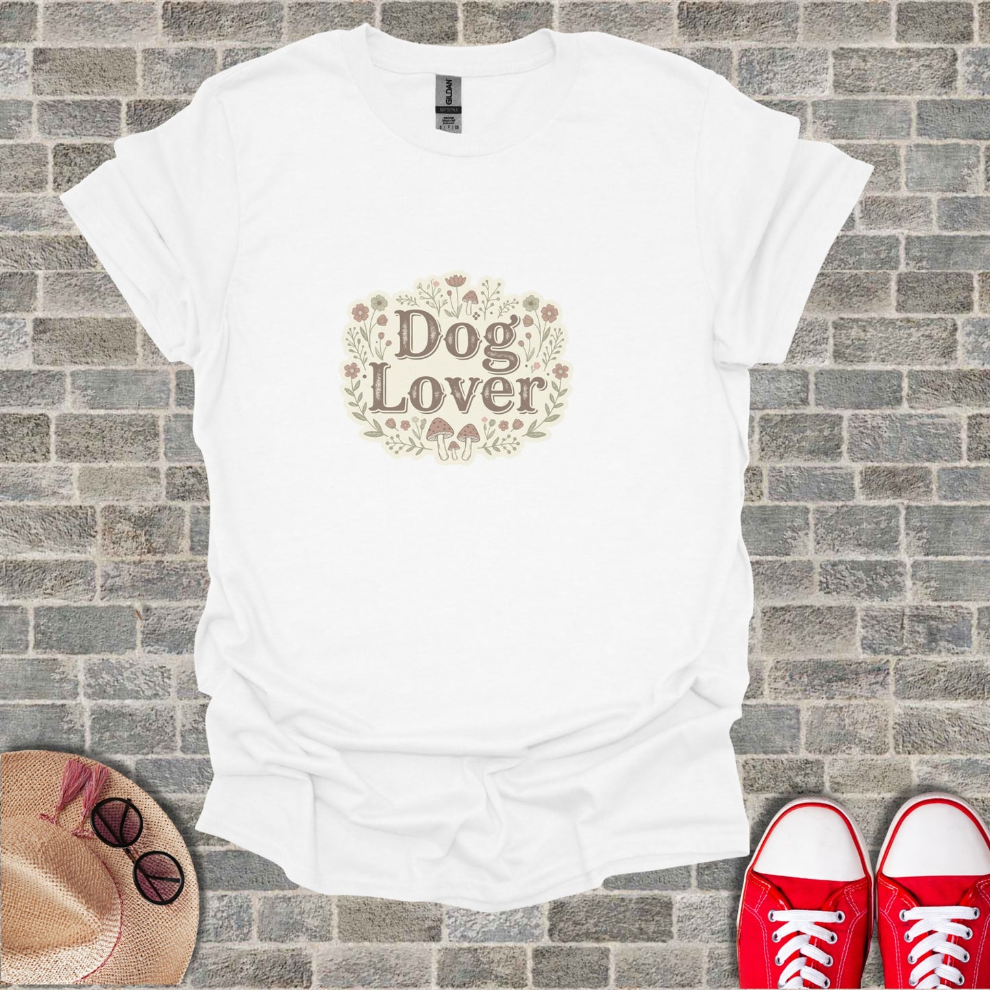 White t-shirt with "Dog Lover" floral and mushroom graphic.