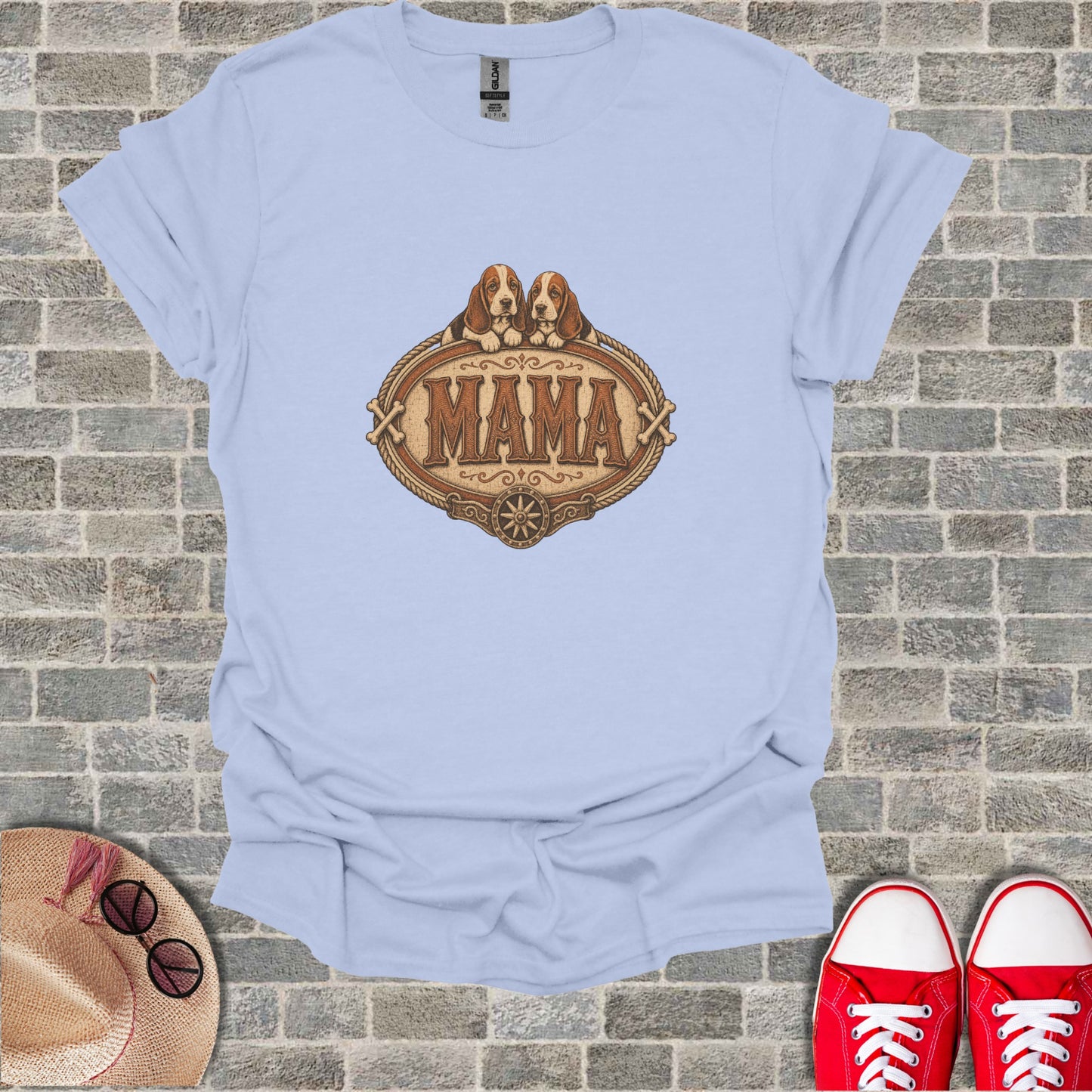 Light blue t-shirt with brown Basset Hound puppies above "Mama" text.
