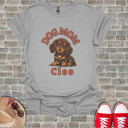 T-shirt with "Dog Mom Cleo" text and dachshund illustration