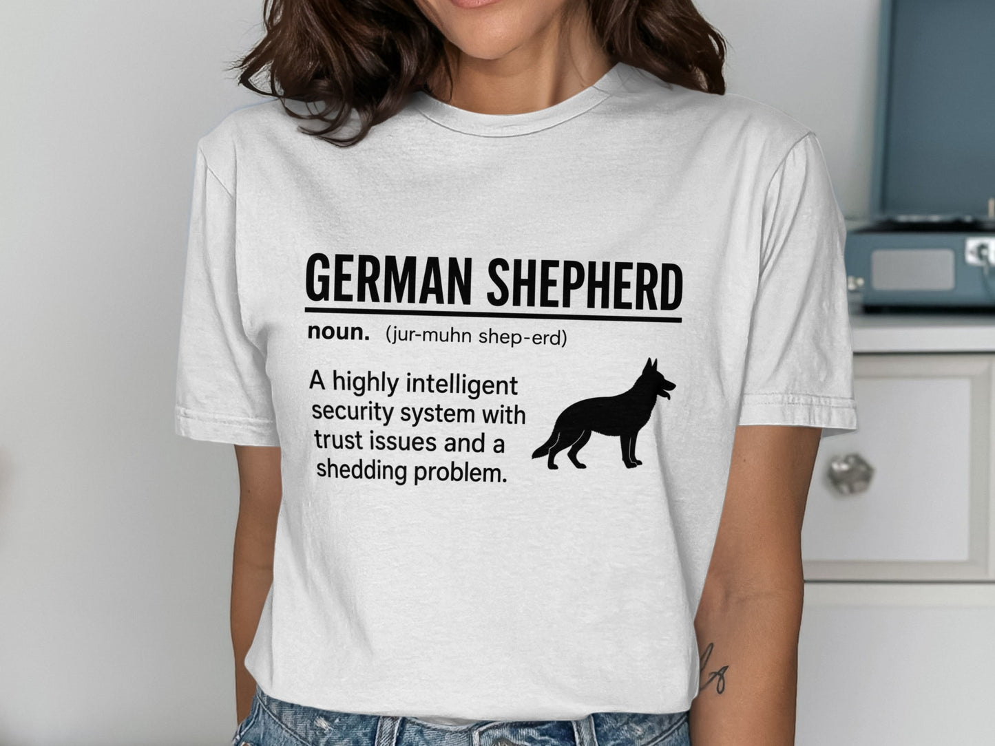 White t-shirt with "GERMAN SHEPHERD" text and dog silhouette.