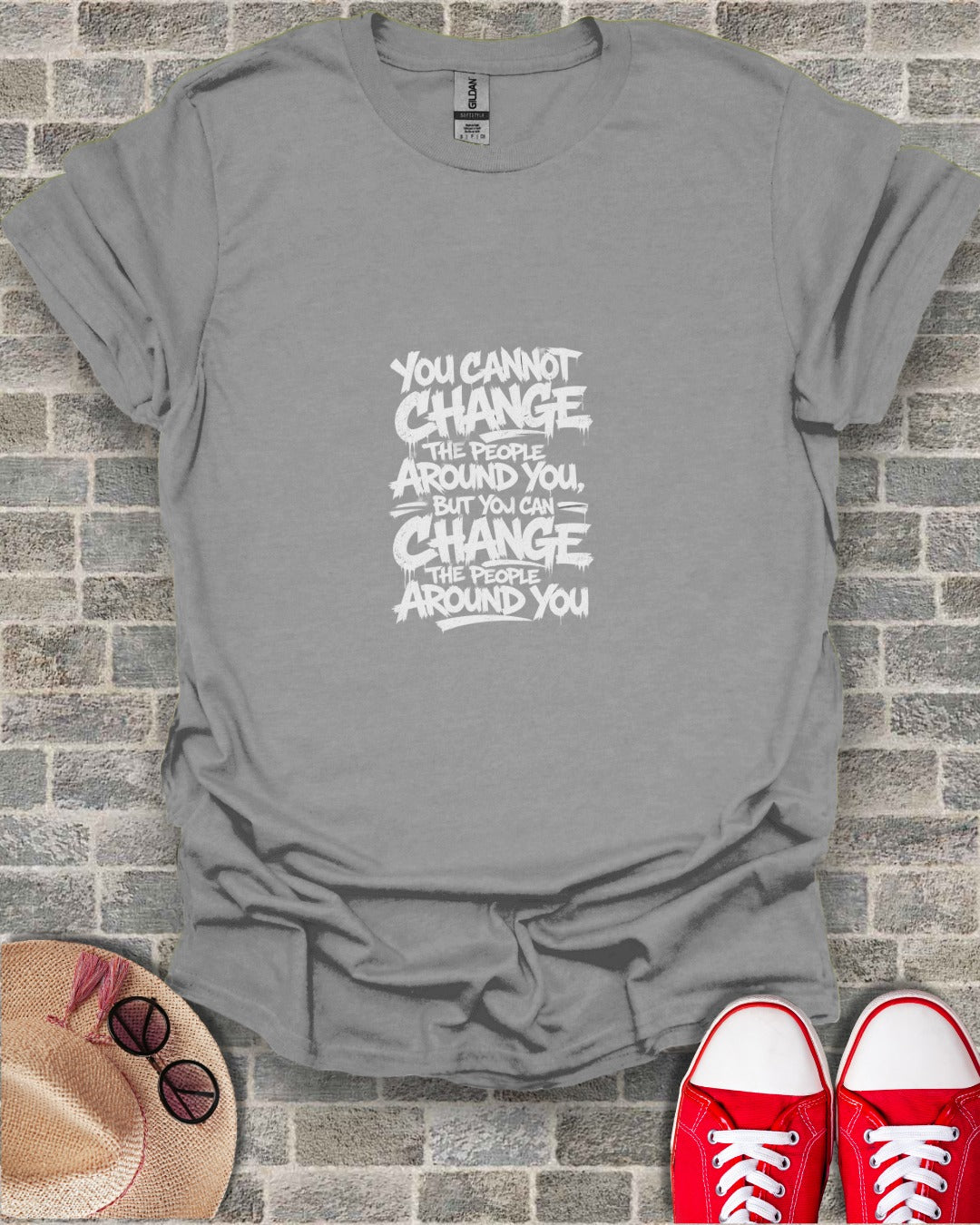 Gray t-shirt with text "You cannot change the people around you, but you can change the people around you."