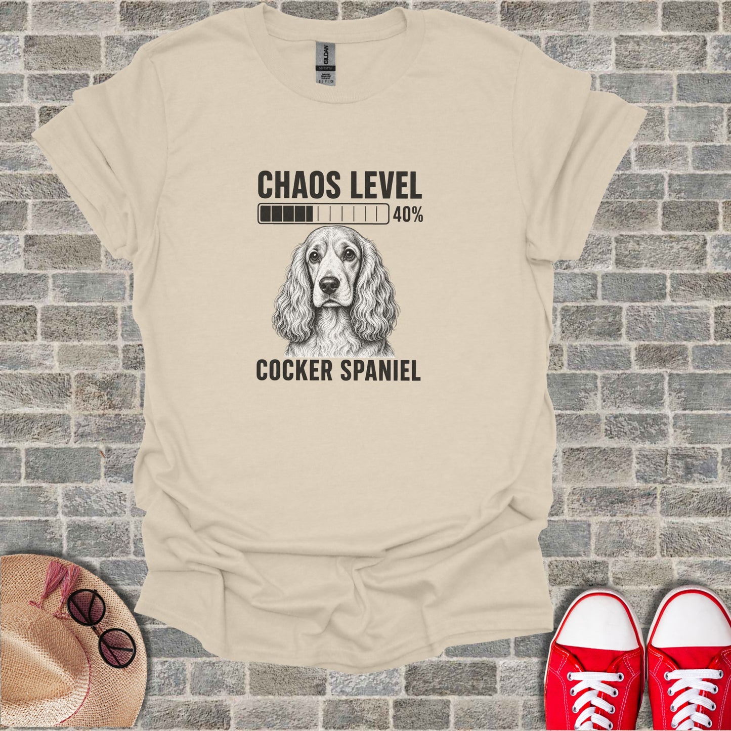T-shirt with Cocker Spaniel drawing and "Chaos Level 40%" text.