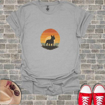 French Bulldog silhouette against a vintage sunset graphic on a grey t-shirt.