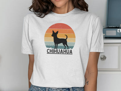 Chihuahua silhouette against a retro sunset on a white t-shirt.