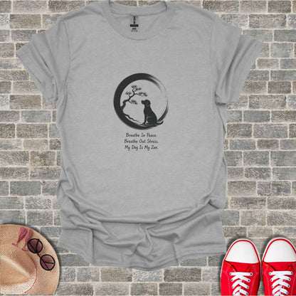 Gray t-shirt with dog, tree, and text "Breathe In Peace. Breathe Out Stress. My Dog Is My Zen."