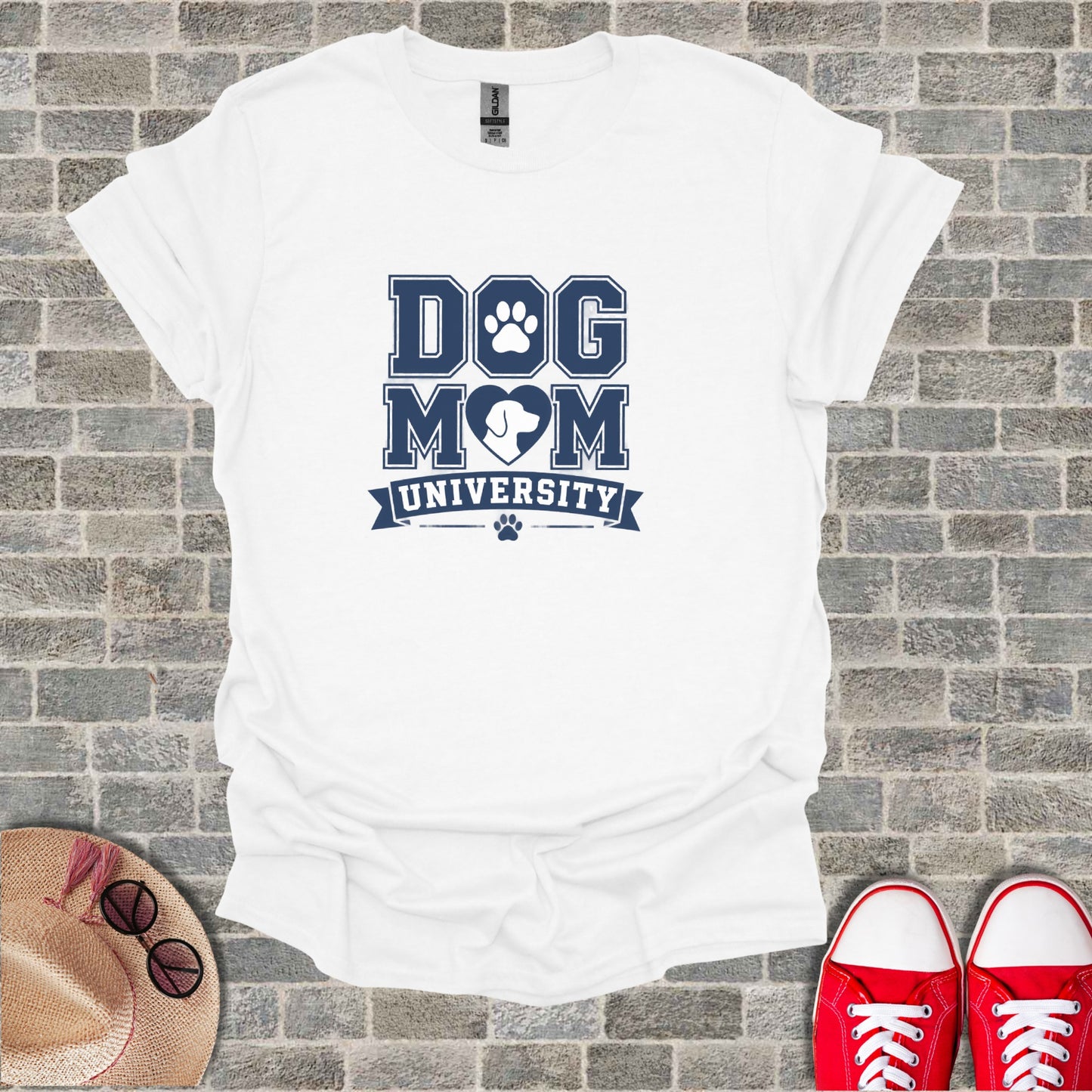 White t-shirt with "Dog Mom University" text and heart paw print design.