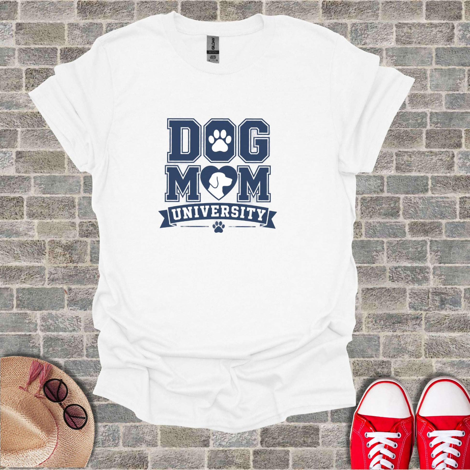 White t-shirt with "Dog Mom University" text and heart paw print design.