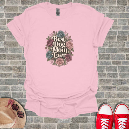 Pink t-shirt with "Best Dog Mom Ever" text and floral design.