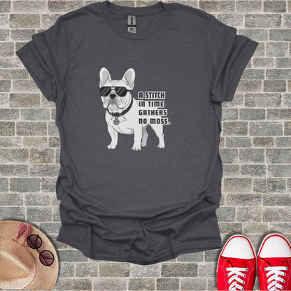 French bulldog wearing sunglasses and collar on t-shirt, "A stitch in time gathers no moss."