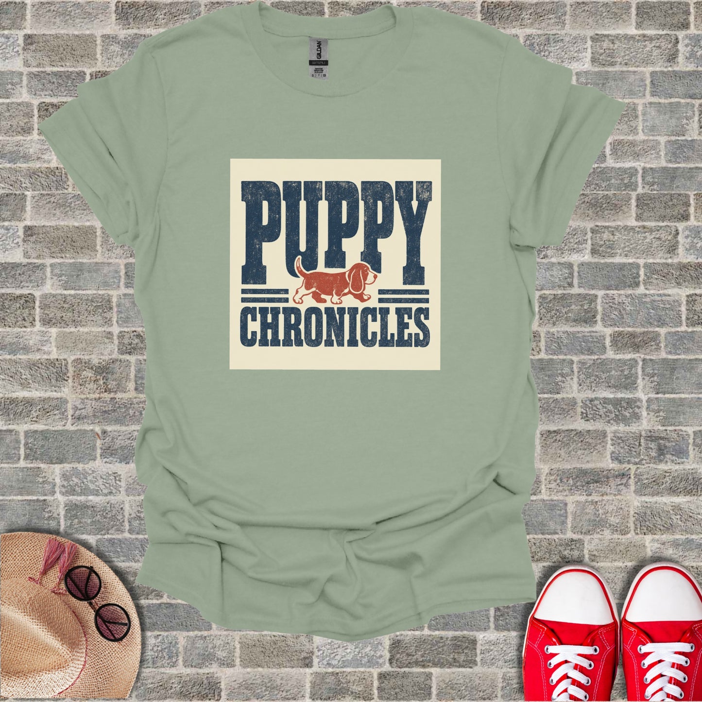 Light green t-shirt with "PUPPY CHRONICLES" text and dog illustration.