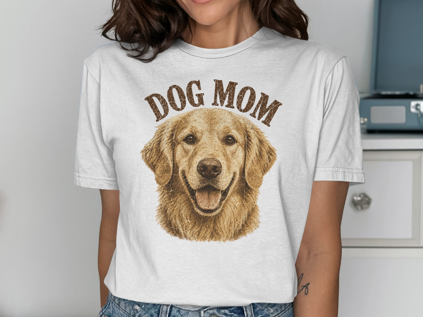 White t-shirt with "DOG MOM" and golden retriever graphic.