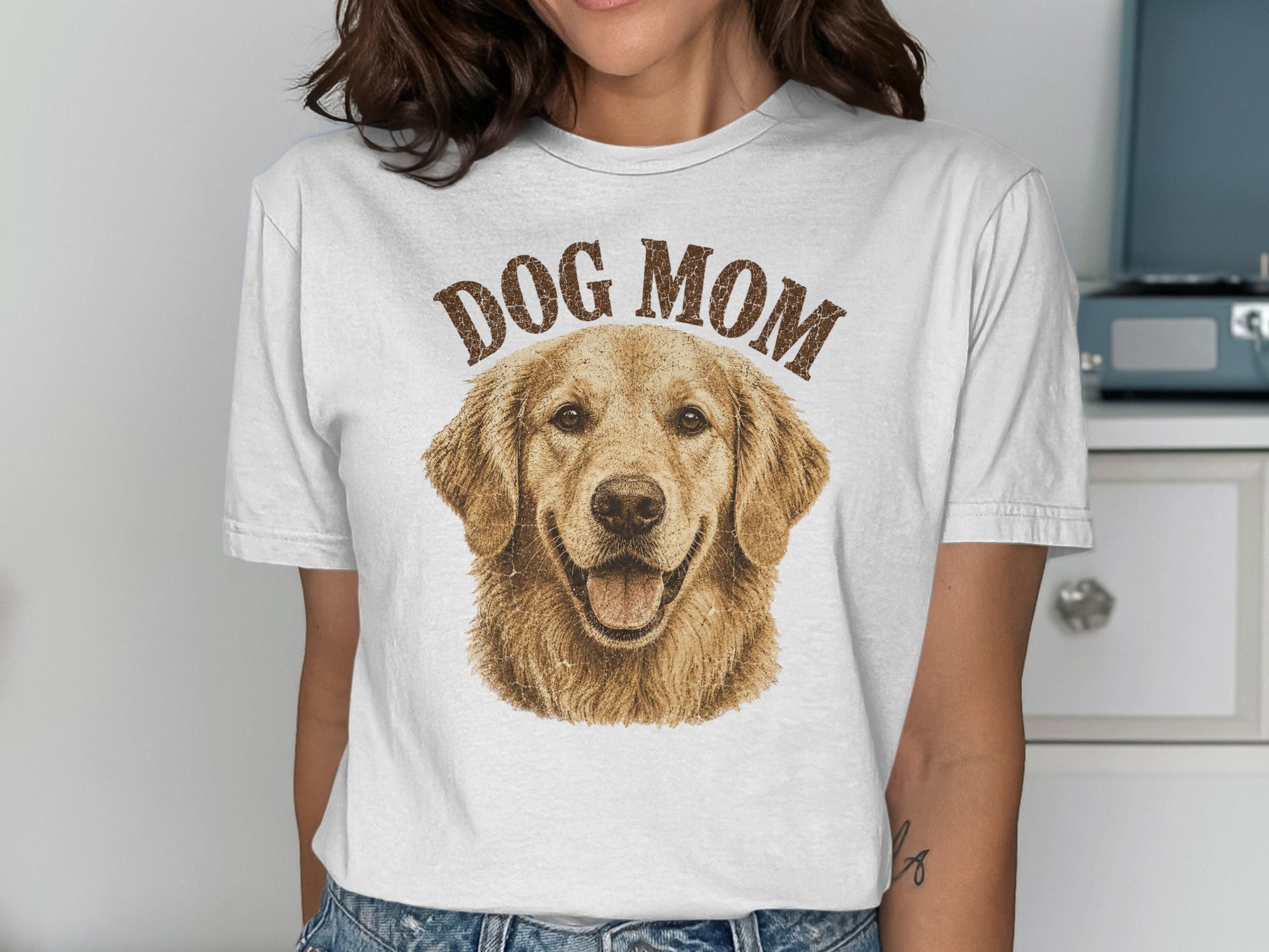 White t-shirt with "DOG MOM" and golden retriever graphic.