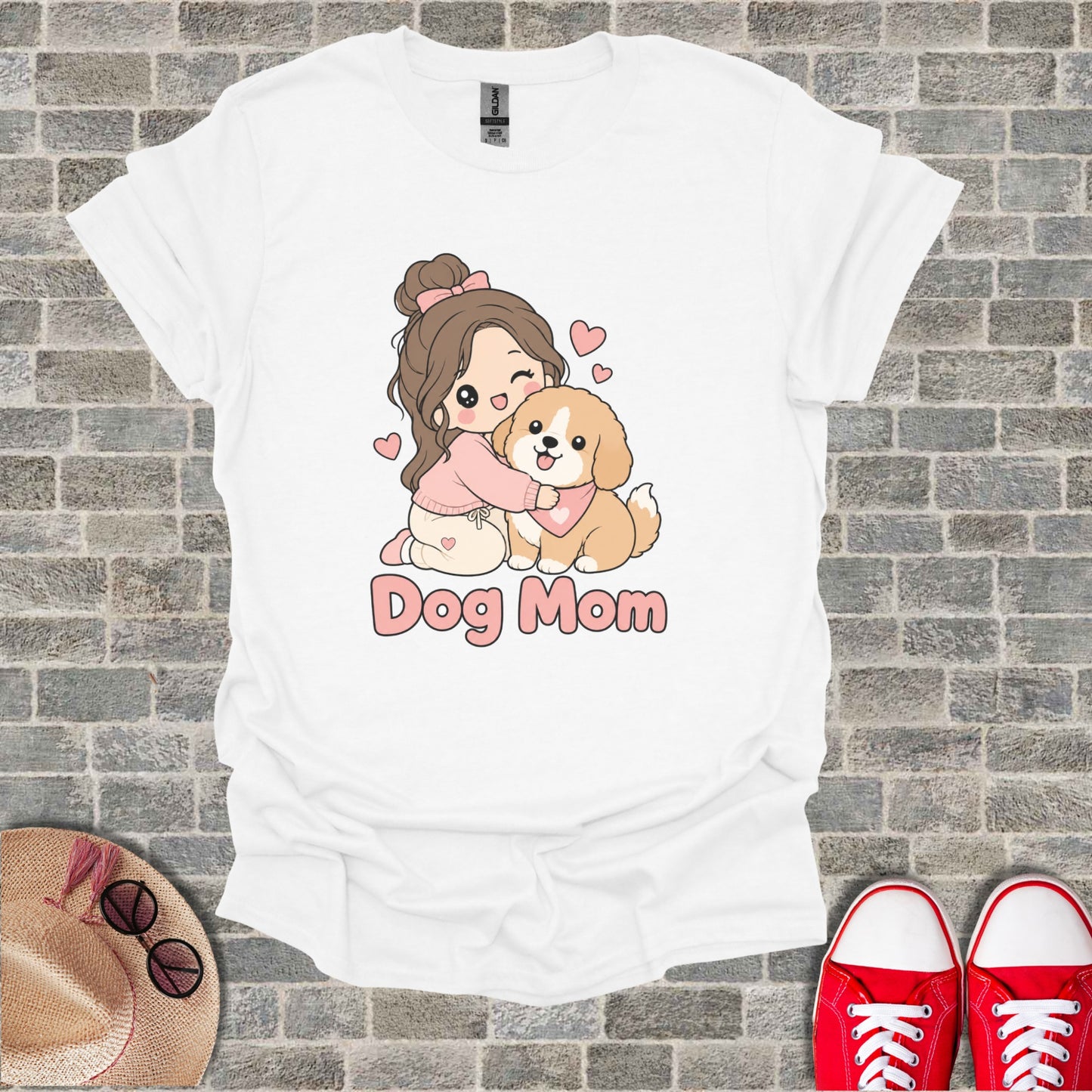 White t-shirt with cartoon girl hugging a dog, text "Dog Mom."