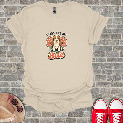 Beagle dog wearing a heart collar with text "DOGS ARE MY BAE".