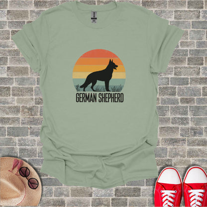 Silhouette of a German Shepherd against a sunset with text.