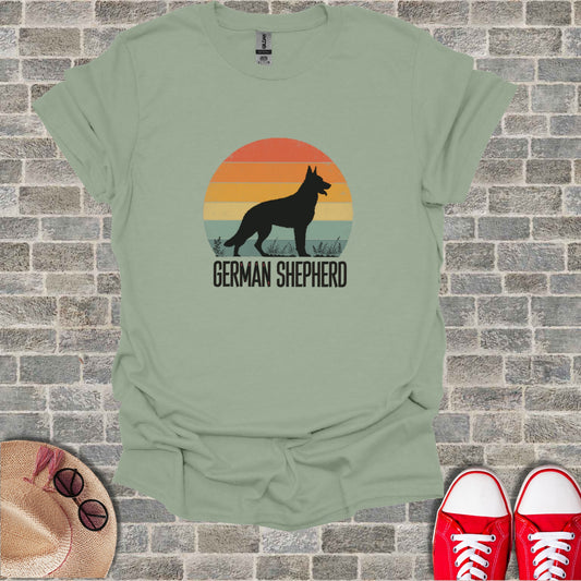 Silhouette of a German Shepherd against a sunset with text.