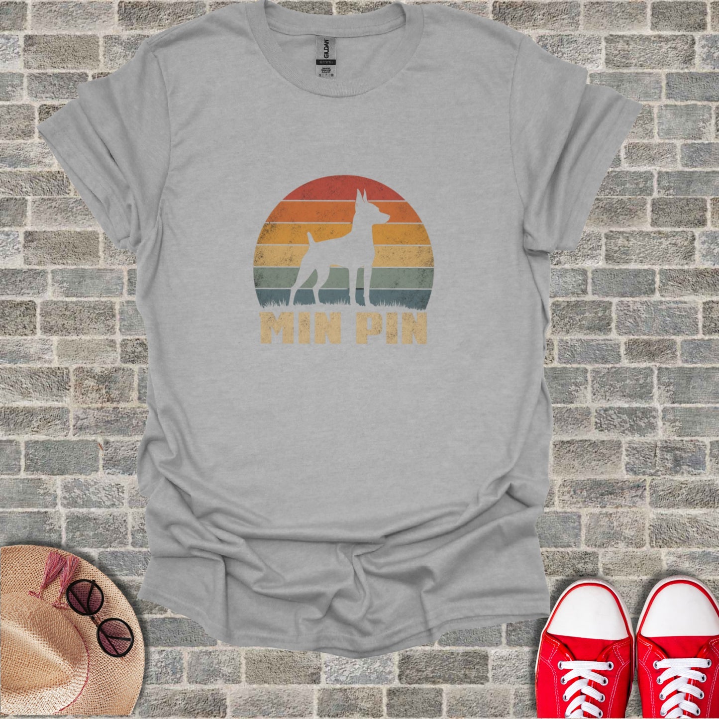 Gray t-shirt with vintage sunset graphic and "MIN PIN" text.