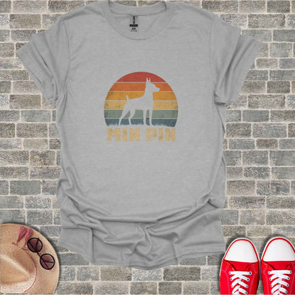 Gray t-shirt with vintage sunset graphic and "MIN PIN" text.