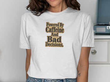 White t-shirt with "Powered By Caffeine And Bad Decisions" text.