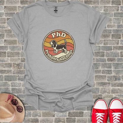 Grey t-shirt with "PhD Probably Has Dogs" distressed text and graphic.