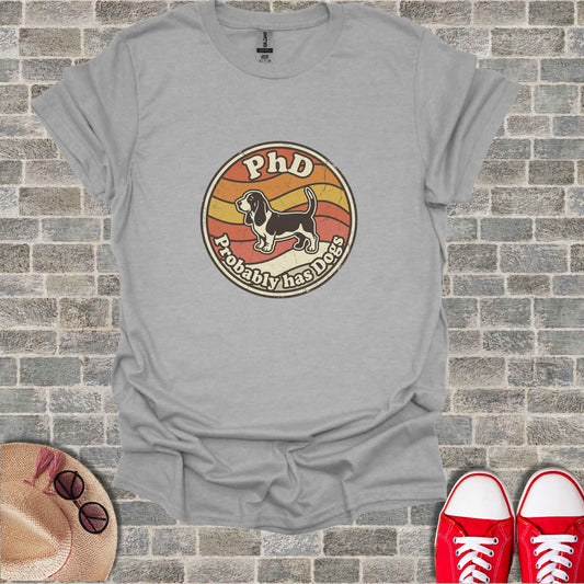 Grey t-shirt with "PhD Probably Has Dogs" distressed text and graphic.
