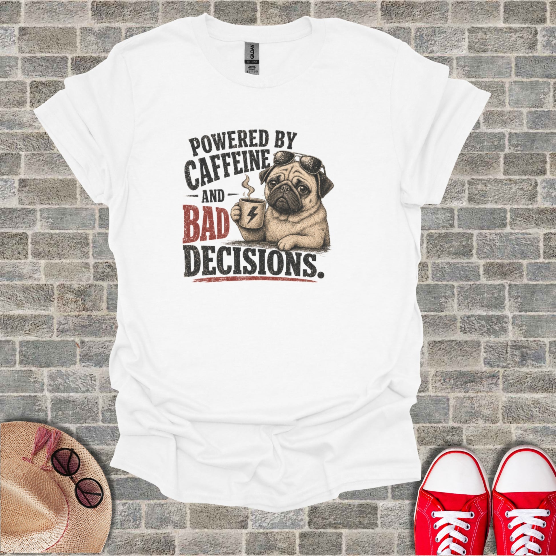 White t-shirt with pug wearing sunglasses, holding coffee, text "Powered by Caffeine and Bad Decisions."