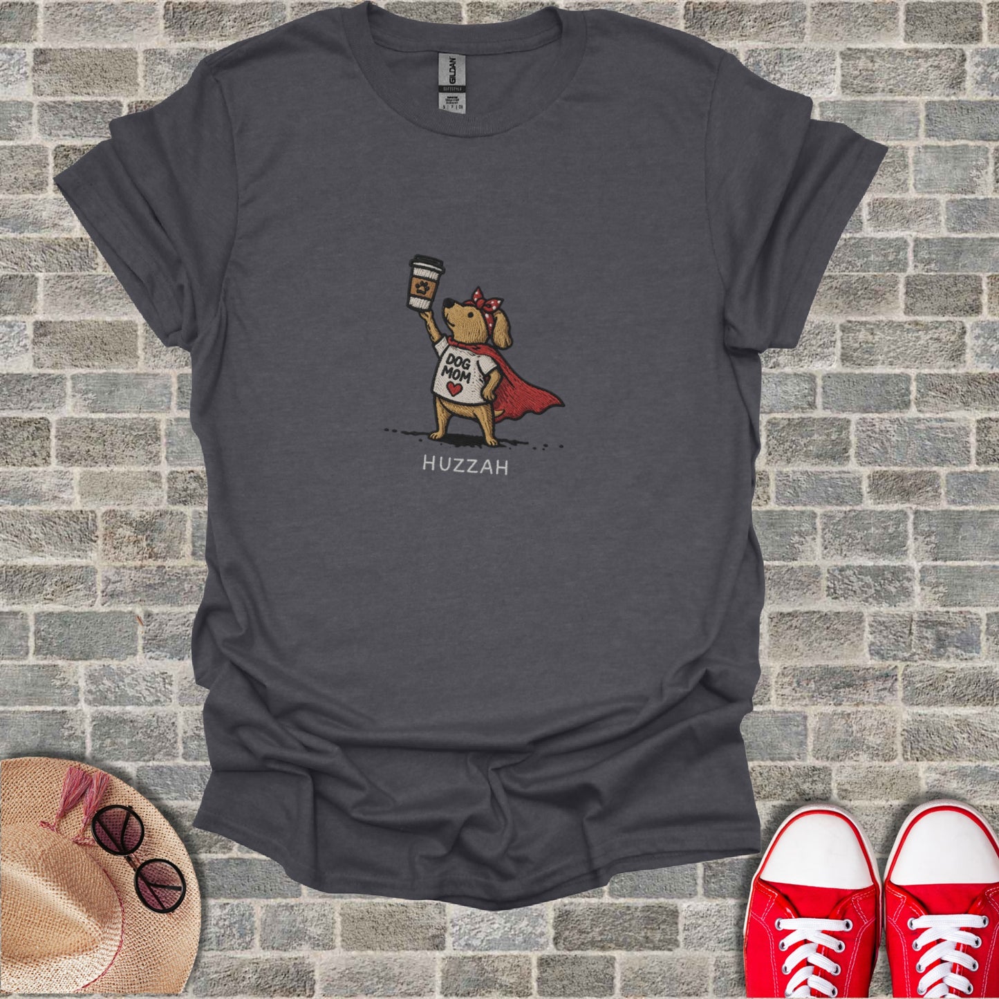 T-shirt with graphic of a dog in a cape holding coffee, "Dog Mom" text.