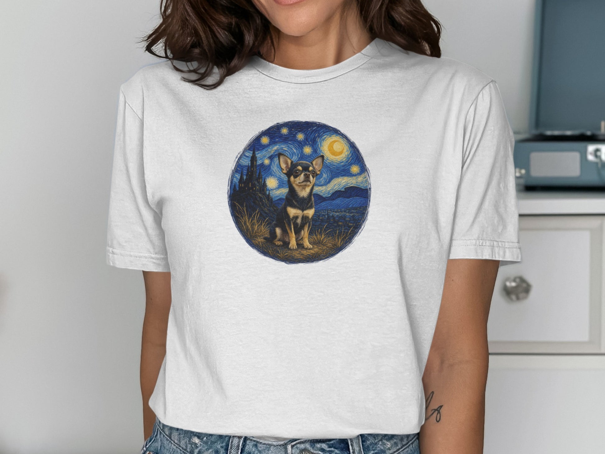 Chihuahua in a starry night landscape on a white t-shirt.