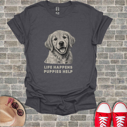 Dark grey t-shirt with sketch of a happy puppy and text "LIFE HAPPENS PUPPIES HELP".