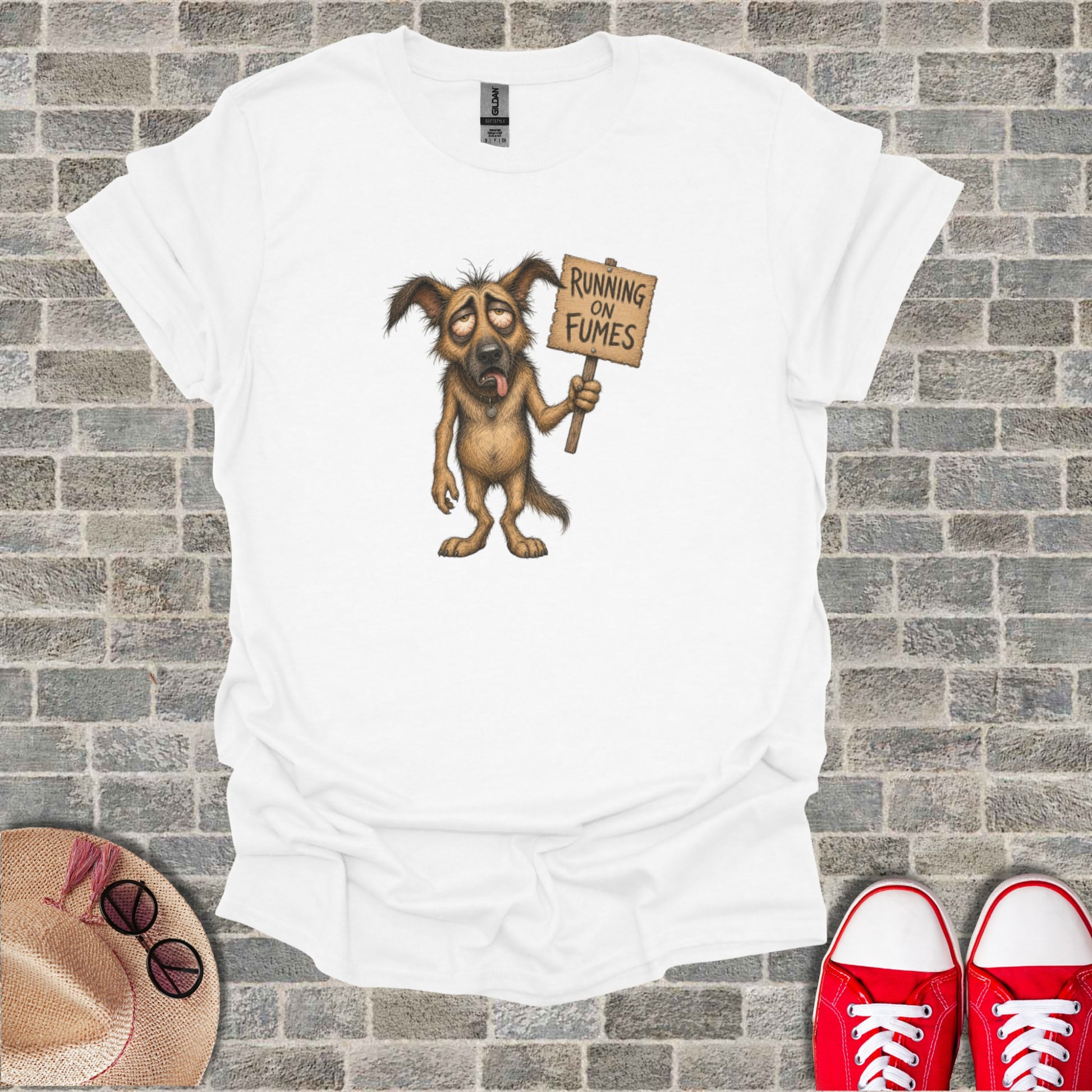 Tired cartoon dog holding "Running on Fumes" sign.