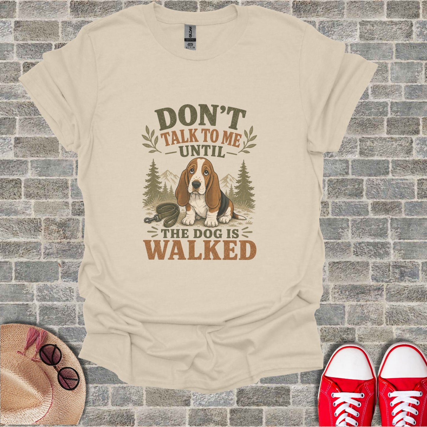 T-shirt with "Don't talk to me until the dog is walked" and a Basset Hound.