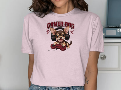 Chihuahua wearing headphones and holding a video game controller, text reads "Gamer Dog".