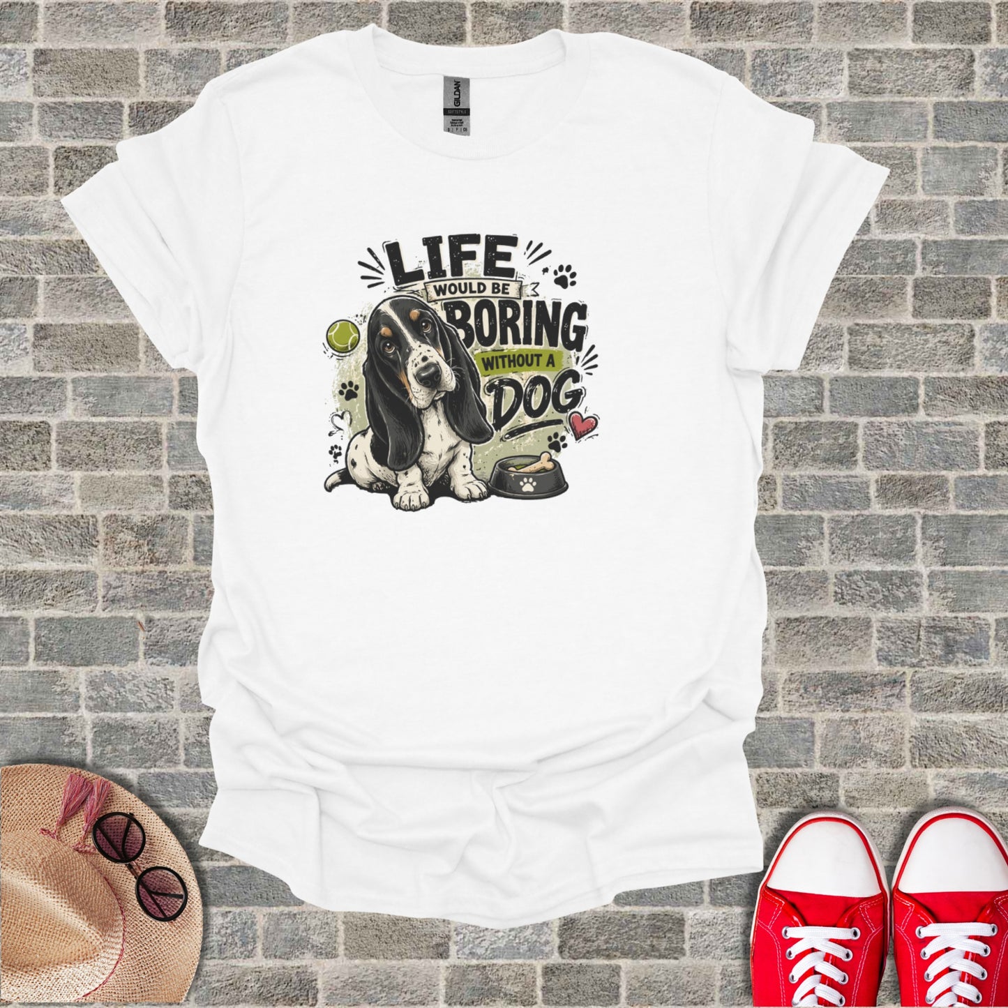 White t-shirt with a basset hound and text reading "Life would be boring without a dog".