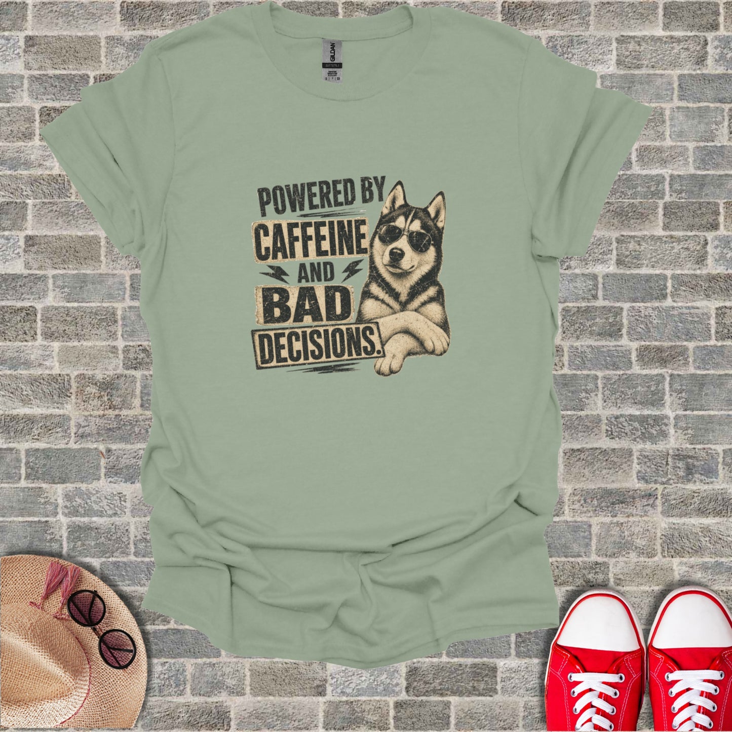 Graphic t-shirt with husky wearing sunglasses, text "Powered by Caffeine and Bad Decisions".