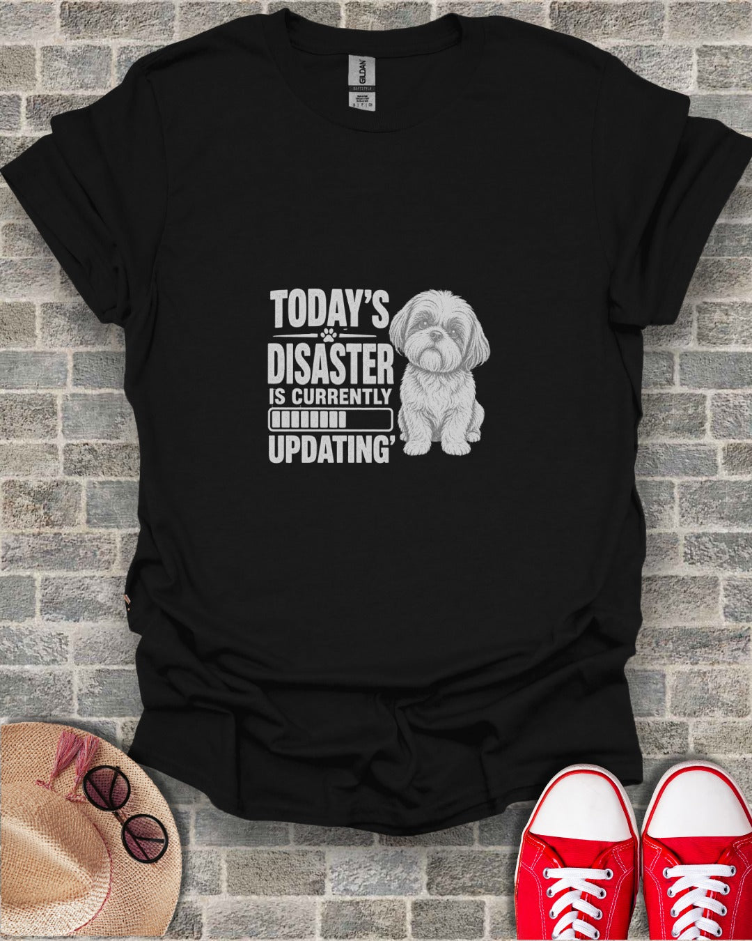 Black t-shirt with a shih tzu and text "Today's disaster is currently updating".