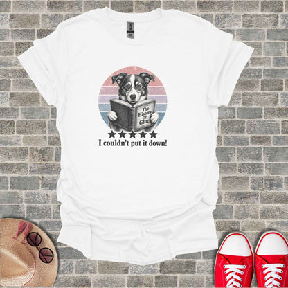 Dog wearing glasses reads "The History of Glue" on a t-shirt.