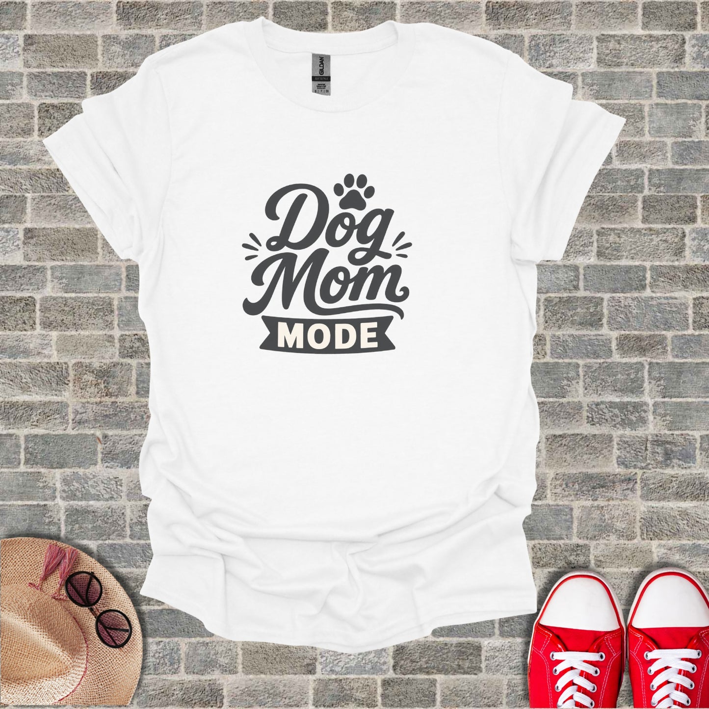 White t-shirt with "Dog Mom Mode" and paw print graphic.