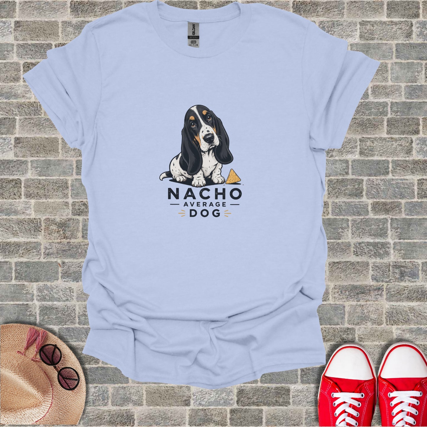 Light blue t-shirt with "Nacho Average Dog" text and a basset hound graphic.
