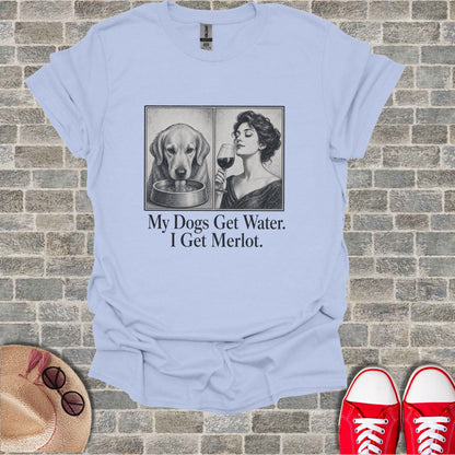 Light blue t-shirt with a dog drinking water and a woman drinking wine.