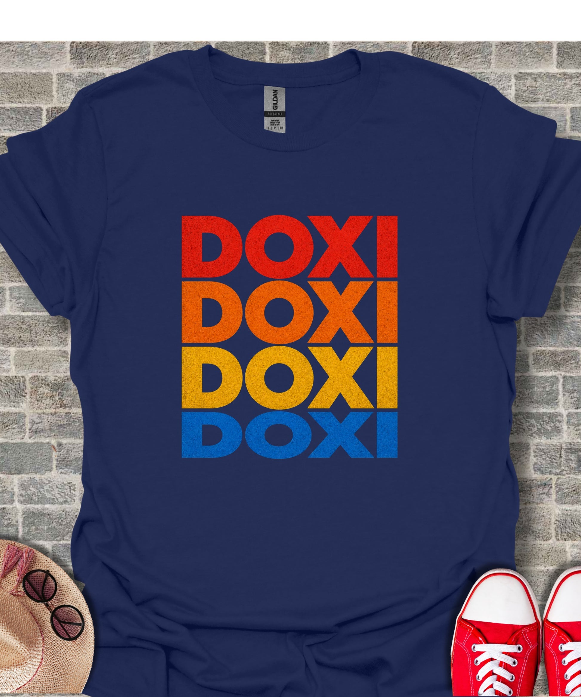 Navy t-shirt with stacked "DOXI" text in red, orange, and blue.
