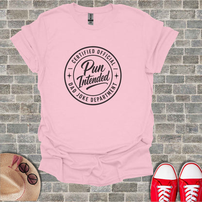 Pink t-shirt with "Certified Official Pun Joke Department" text.