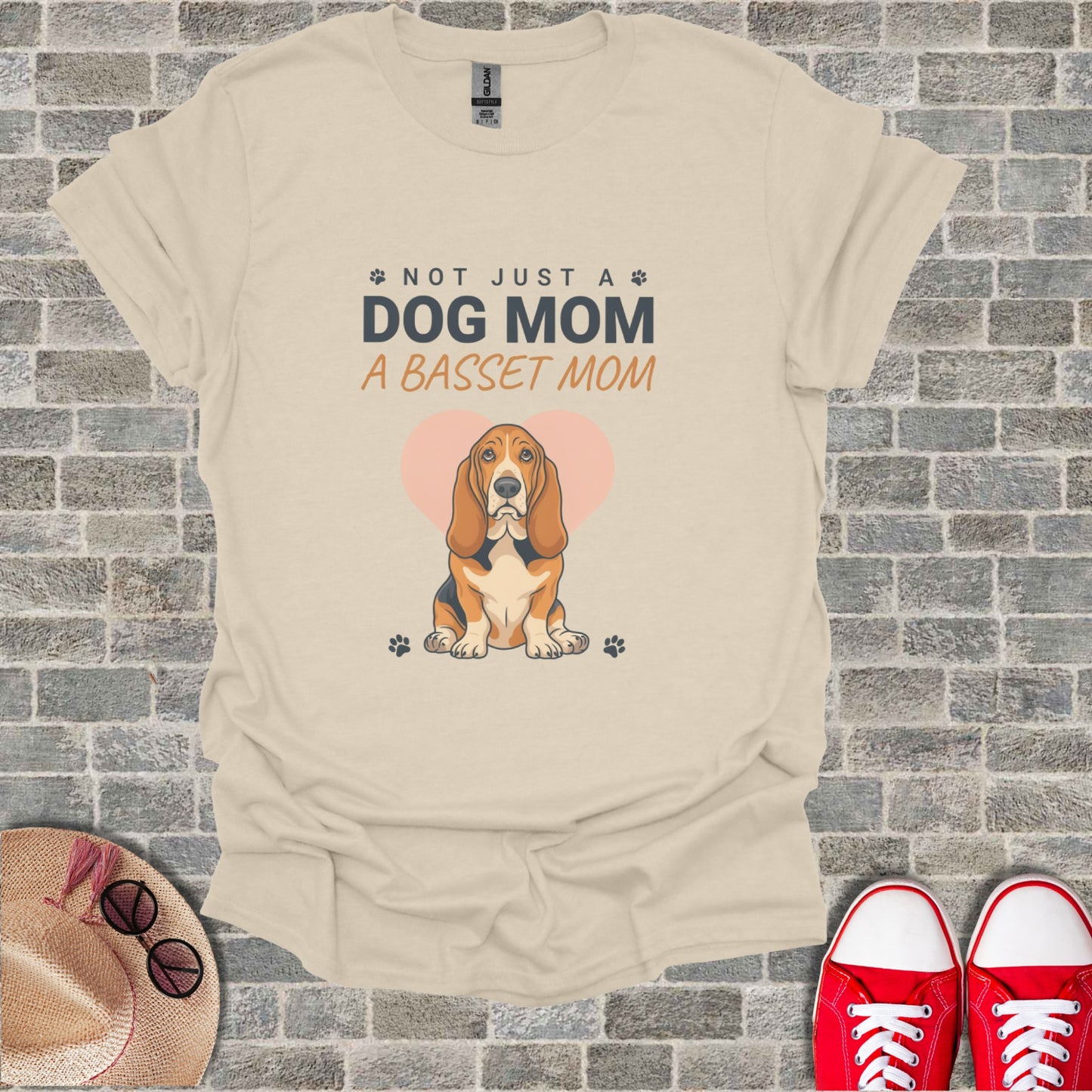 Cream t-shirt with "Not Just a Dog Mom, A Basset Mom" and Basset Hound graphic.