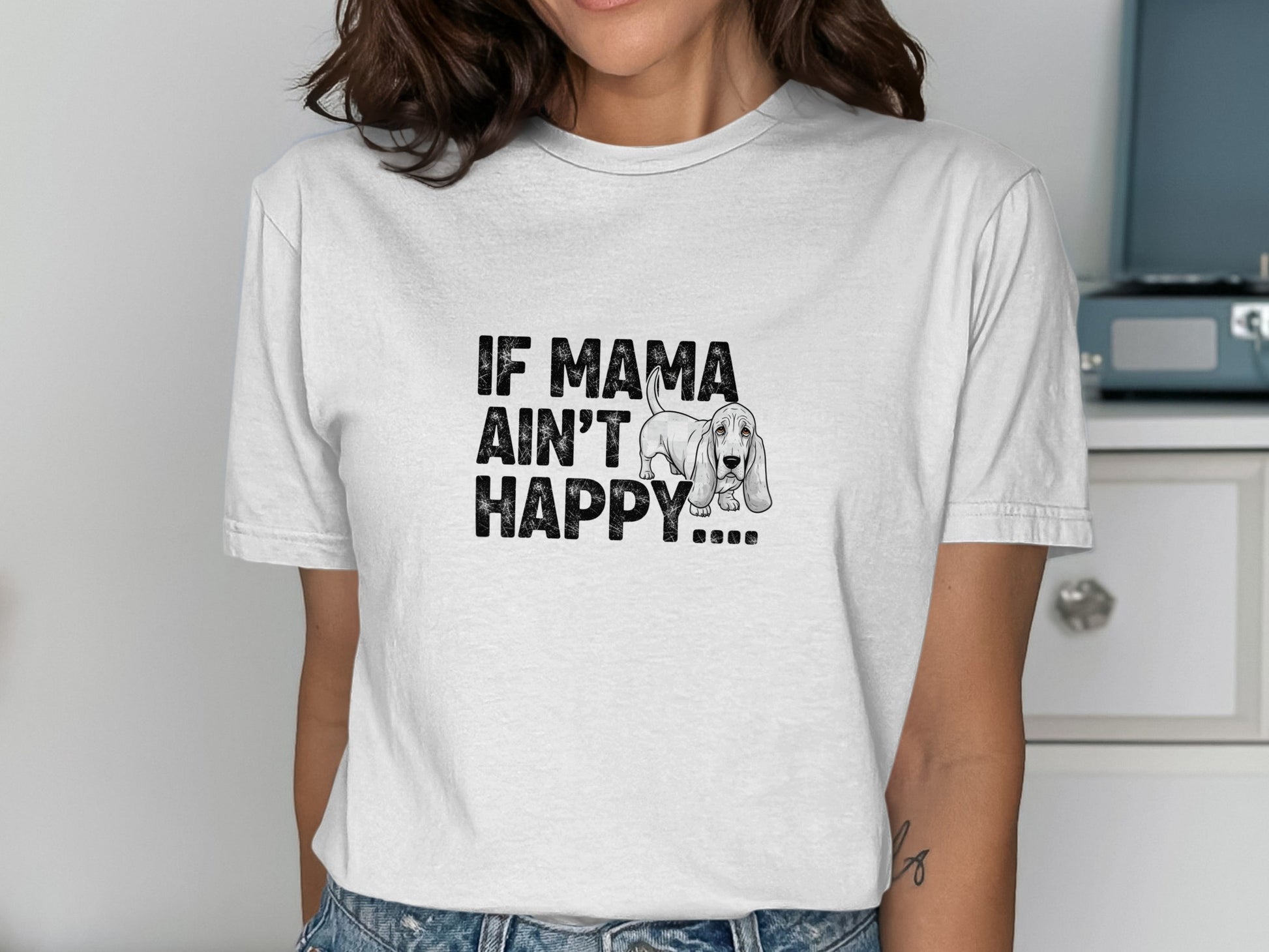 White t-shirt with "If Mama Ain't Happy..." and a basset hound graphic.