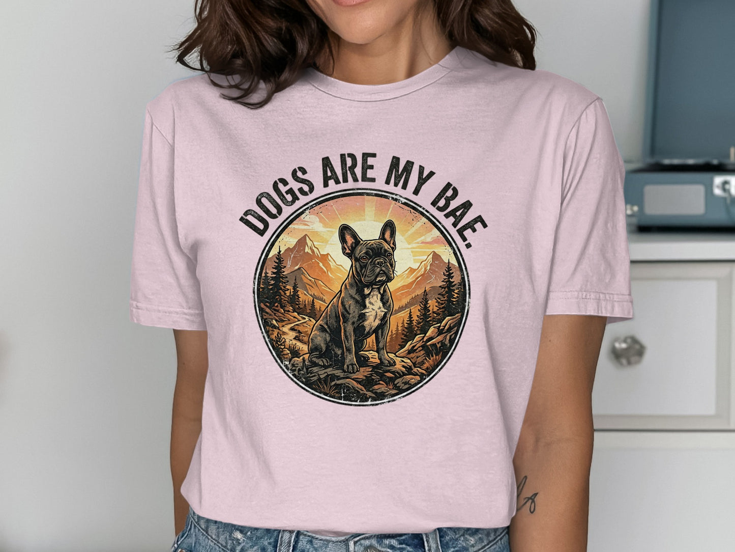 T-shirt with a French bulldog in a scenic mountain landscape, text reads "DOGS ARE MY BAE."